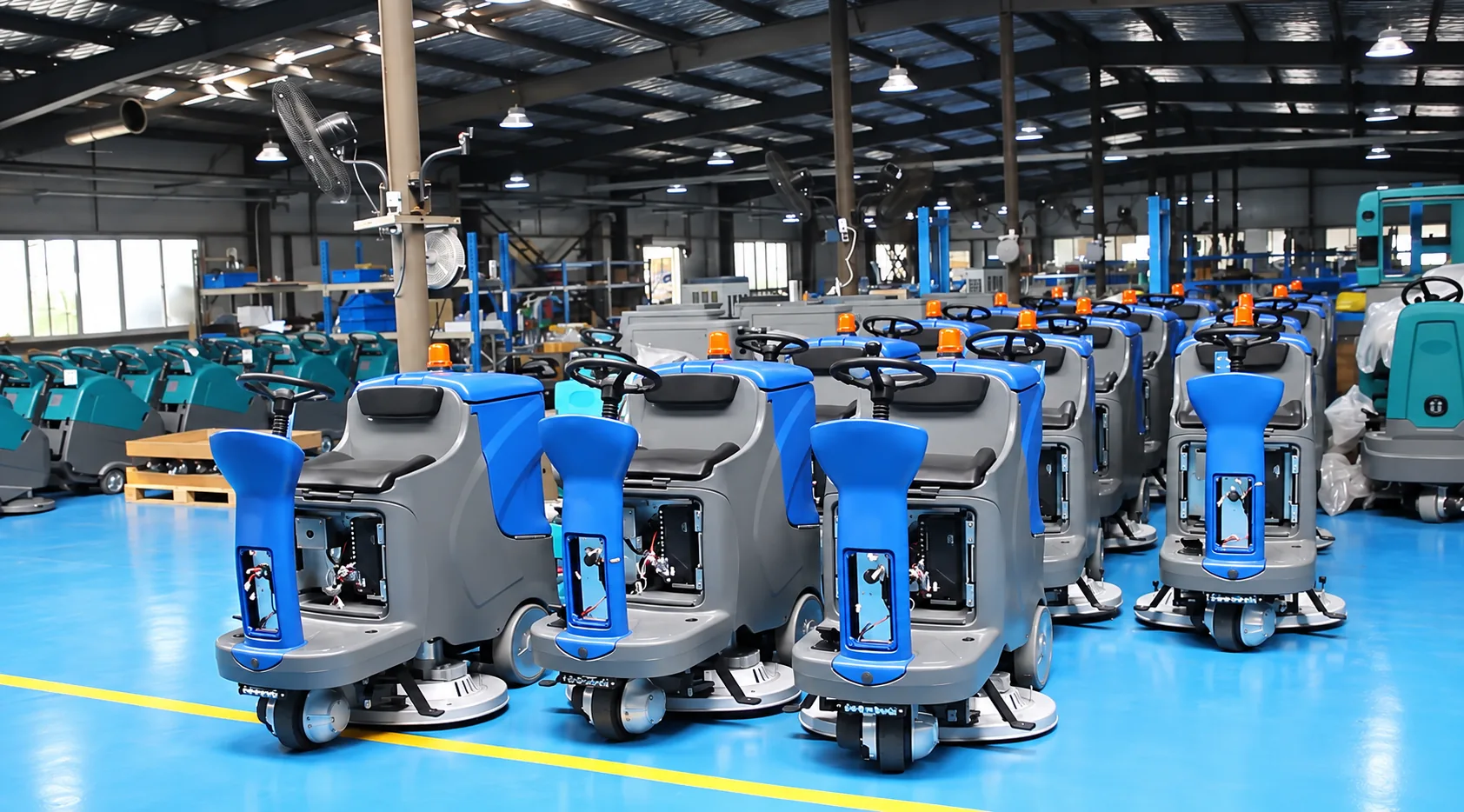 Technicians assembling industrial floor cleaning machines